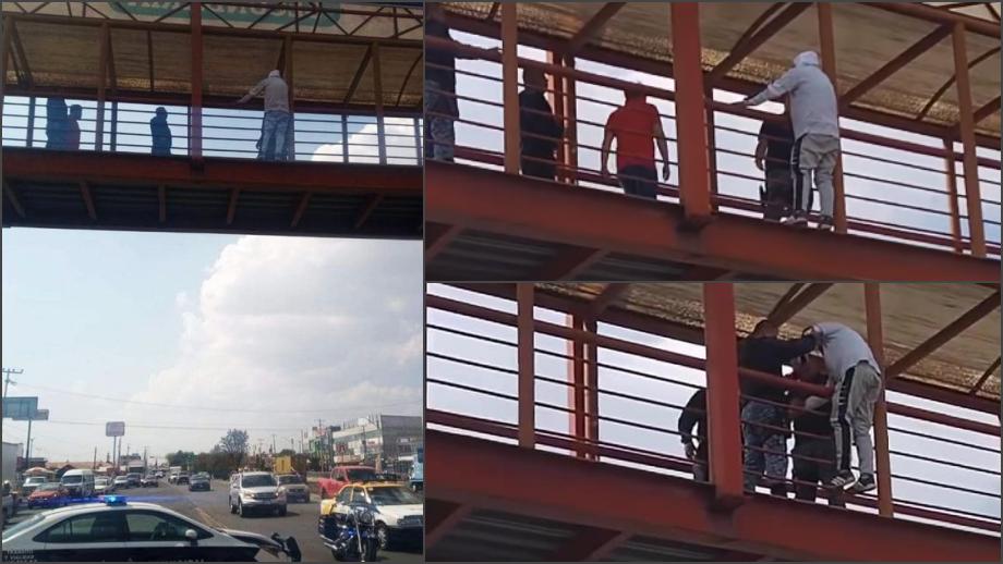 Policías evitan que un hombre se arroje de un puente en Pachuca (video)